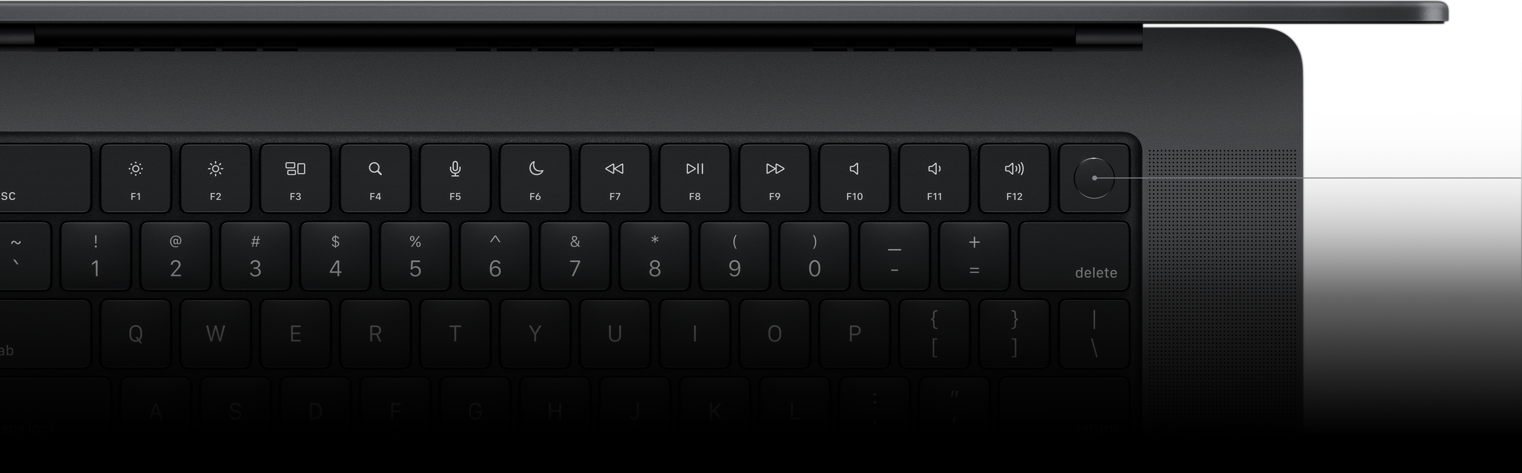 Pointeur désignant la touche Touch ID du Magic Keyboard.