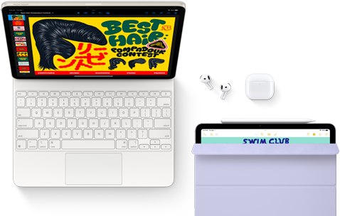 Un iPad Air agganciato a una Magic Keyboard, con accanto un paio di AirPods Pro, una Apple Pencil Pro e una custodia Smart Folio